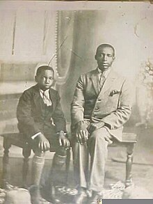 James Beauttah (right) with son Henry Rohara Beauttah in the early 1920s