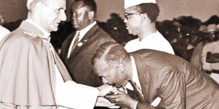 The Minister for Local Government, Mr Lawrence Sagini, kissing Pope Paul VI’s ring at the Entebbe Airport before the Pontif boarded a plane back to Rome on August 25,1969. Mr Sagini was in a Kenyan delegation to Kampala.