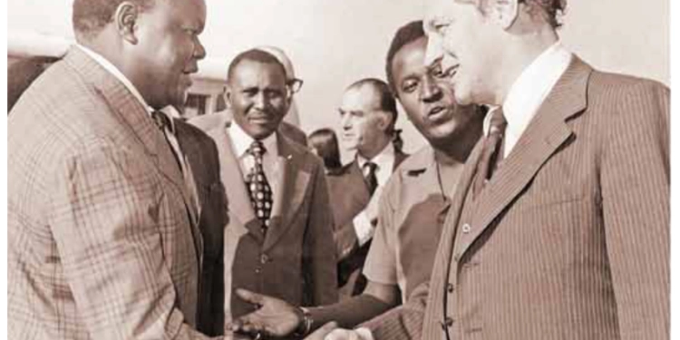 The Premier of Nova Scotia, Mr Genald Regan (right), is welcomed on arrival in Nairobi by Health Minister James Osogo on September 11, 1976.