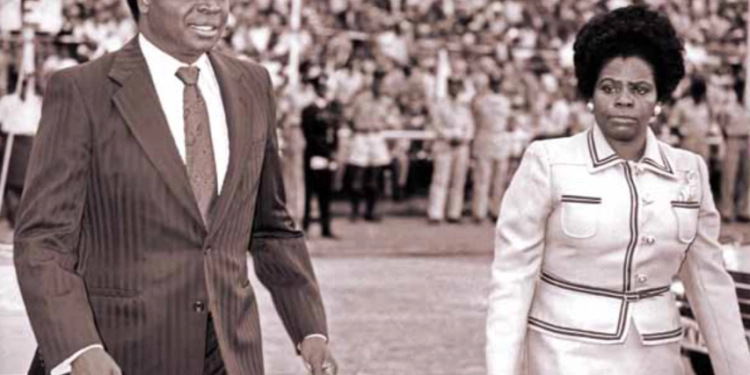 Finance Minister Mwai Kibaki with his wife Lucy Muthoni arrive at Uhuru Park in Nairobi for the Jamhuri Day celebrations presided over by Mzee Jomo Kenyatta on December 12, 1973.