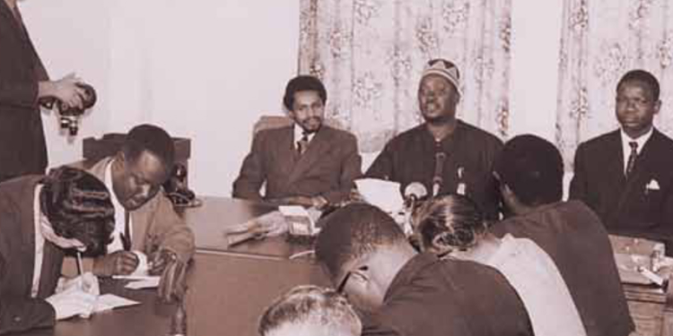 The Minister for Home Afairs, Mr Oginga Odinga, fanked by the Permanent Secretary, Mr Kitili Mwendwa, and Information, Broadcasting and Tourism Permanent Secretary J. N. Oluoch (right), criticises the British press at a media conference on August 27, 1964. In December 1964, Mr Odinga went on to become Kenya’s first Vice- President and, later in the decade, Mr Mwendwa was appointed the first African Chief Justice.
