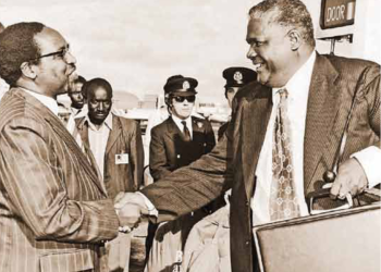 The Minister for Foreign Afairs, Dr. Munyua Waiyaki (left), welcomes the founder-leader of the Zimbabwe African People’s Union (ZAPU), Mr Joshua Nkomo, who made a stop over at the Nairobi Airport in transit from London on June 22, 1976.