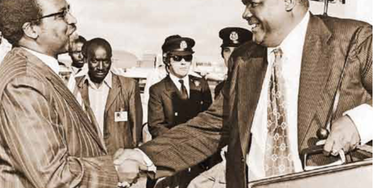 The Minister for Foreign Afairs, Dr. Munyua Waiyaki (left), welcomes the founder-leader of the Zimbabwe African People’s Union (ZAPU), Mr Joshua Nkomo, who made a stop over at the Nairobi Airport in transit from London on June 22, 1976.