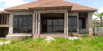 Outstanding Property Opportunity: Partially Completed Home in Kira Town, Nsaasa