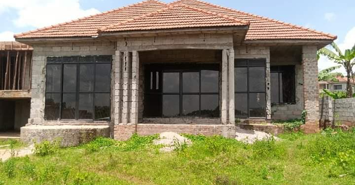 Outstanding Property Opportunity: Partially Completed Home in Kira Town, Nsaasa