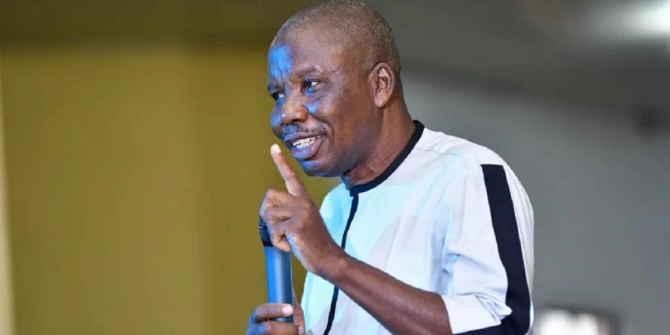 Biography of Dr. Charles Apoki