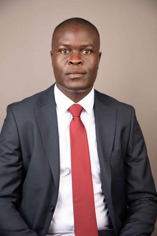 Hon. Sloya, Clement