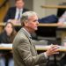 Judd Gregg speaking at a budget policy forum – Judd Gregg net worth
