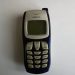 Sendo P200 feature phone with classic monochrome screen and green casing