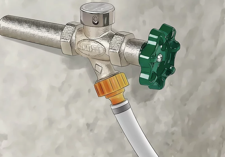 Close-up illustration of an RV water heater valve with a hose connection and control knob for water flow.
