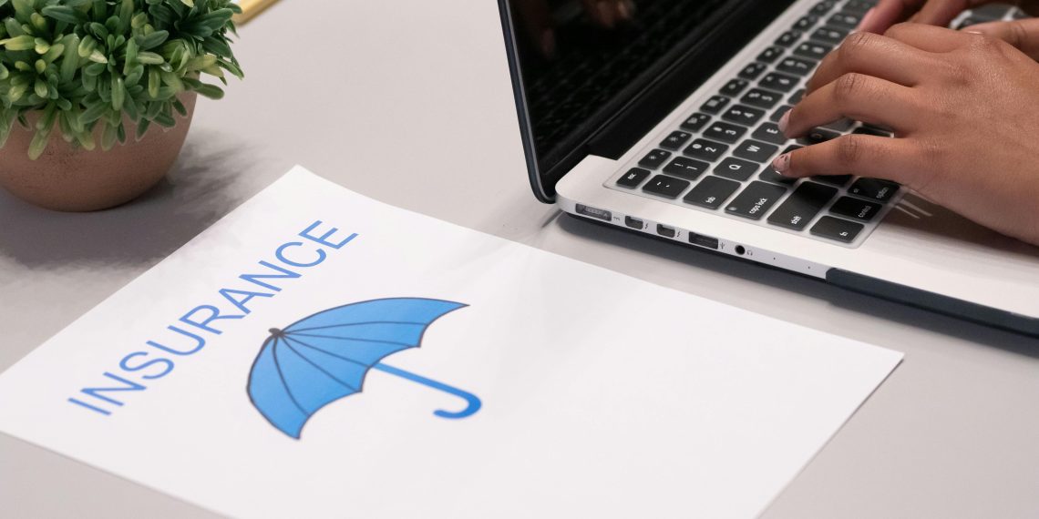 Photo by Kindel Media: https://www.pexels.com/photo/a-paper-beside-a-person-typing-on-a-laptop-7688374/